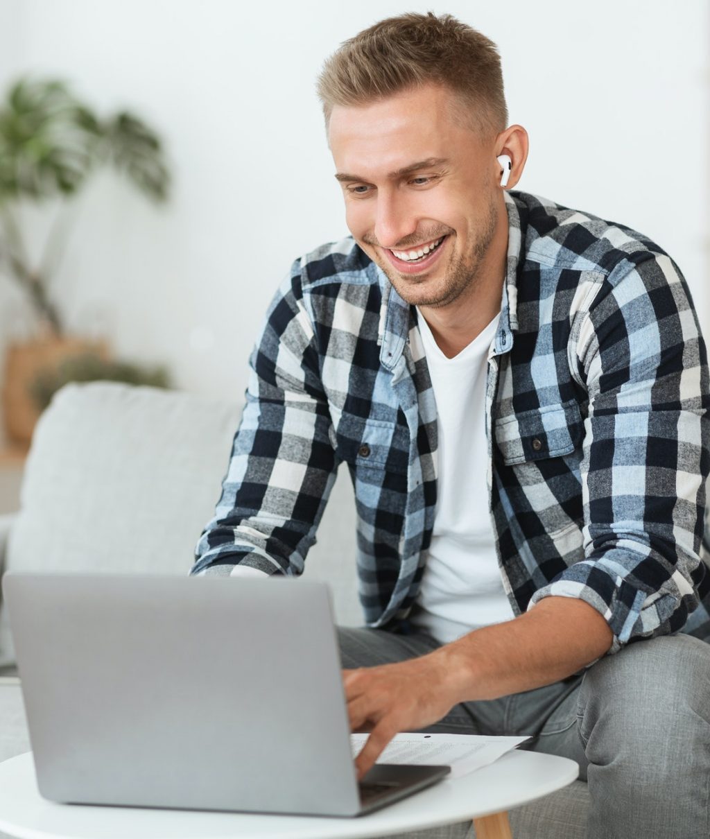 guy-listening-to-music-online-in-headphones.jpg